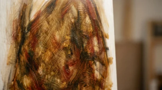 Close-up detail of an egg tempera painting showing the characteristic luminous glow and fine brushwork detail on a smooth gesso panel